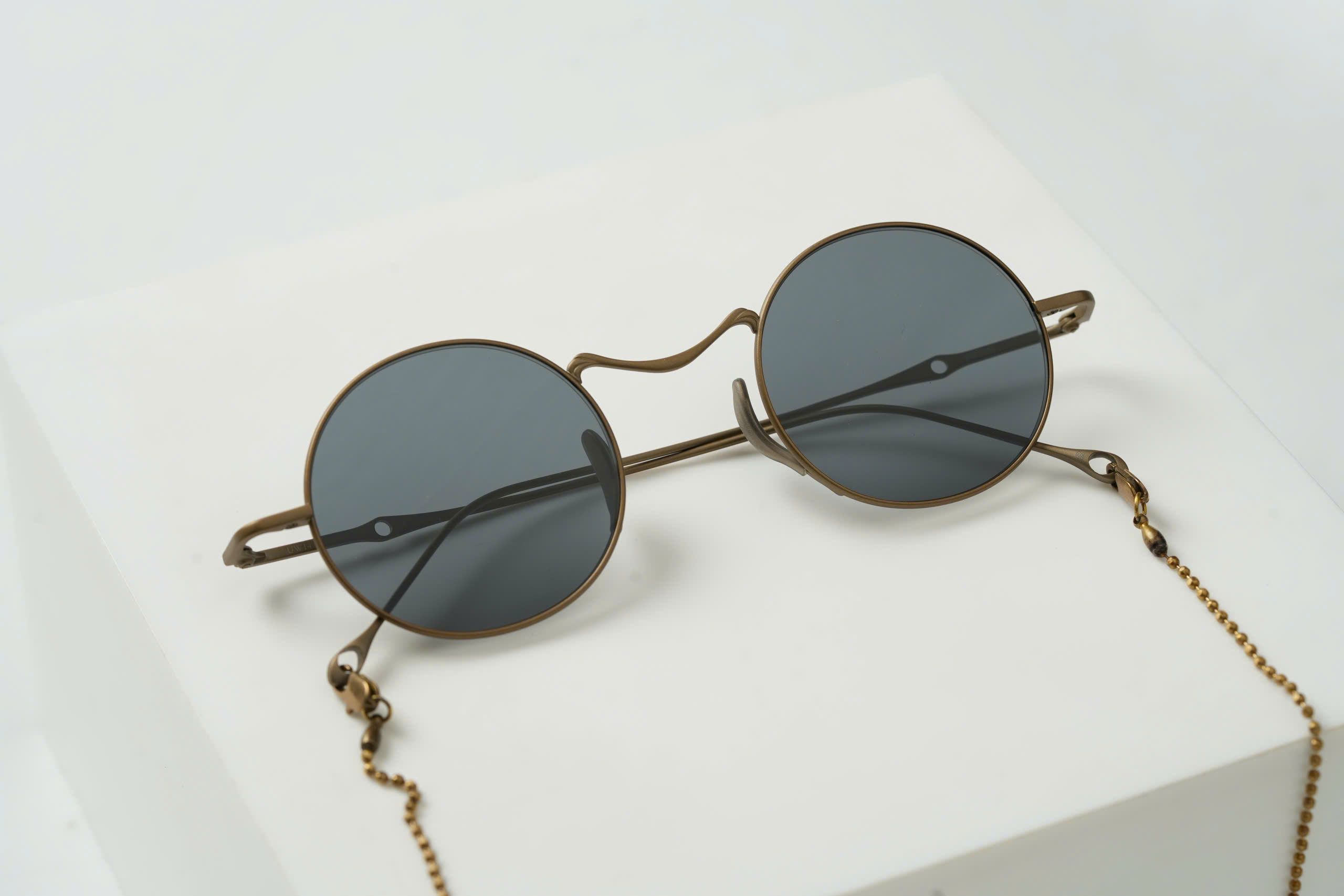 RG00UW14/ANTIQUE BRONZE x SUN