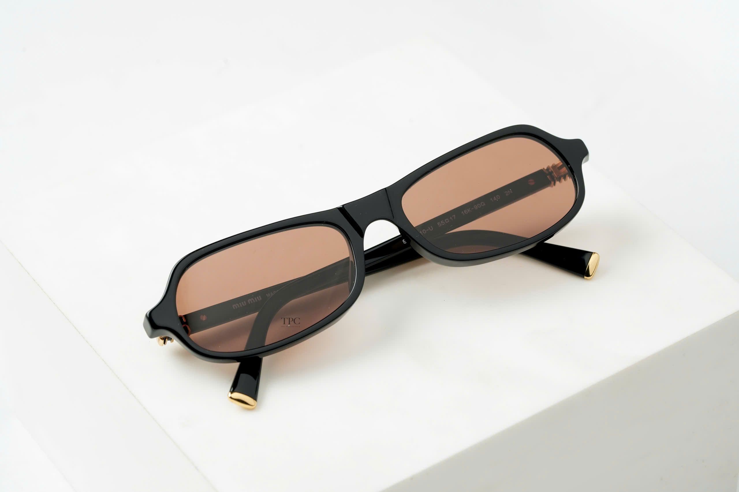 Miu Miu 0MU B10SU - 16K90Q